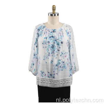 Damesblouse met 3/4 mouwen kanten afwerking